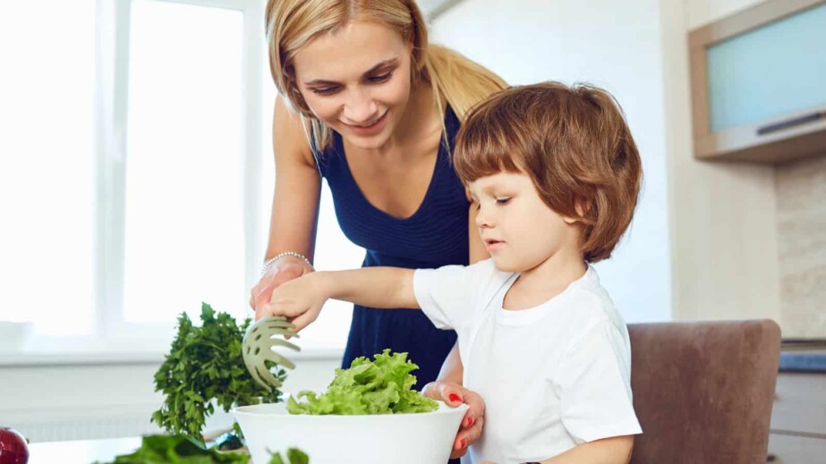 mom and child preparing food