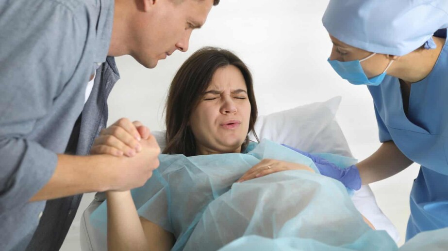 woman giving child birth