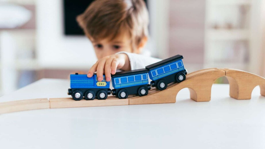 Boy playing with trains