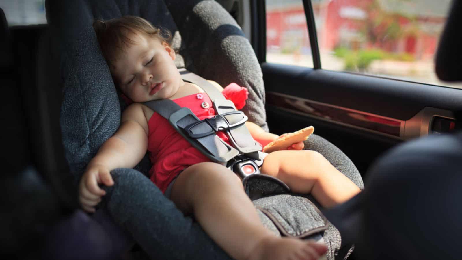 Child sleeping in car
