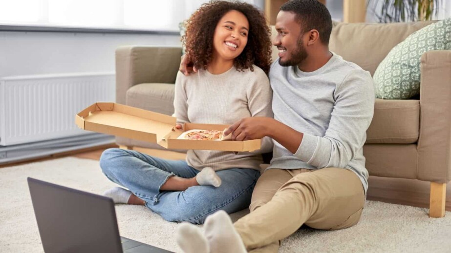 Happy Couple Eating Pizza 