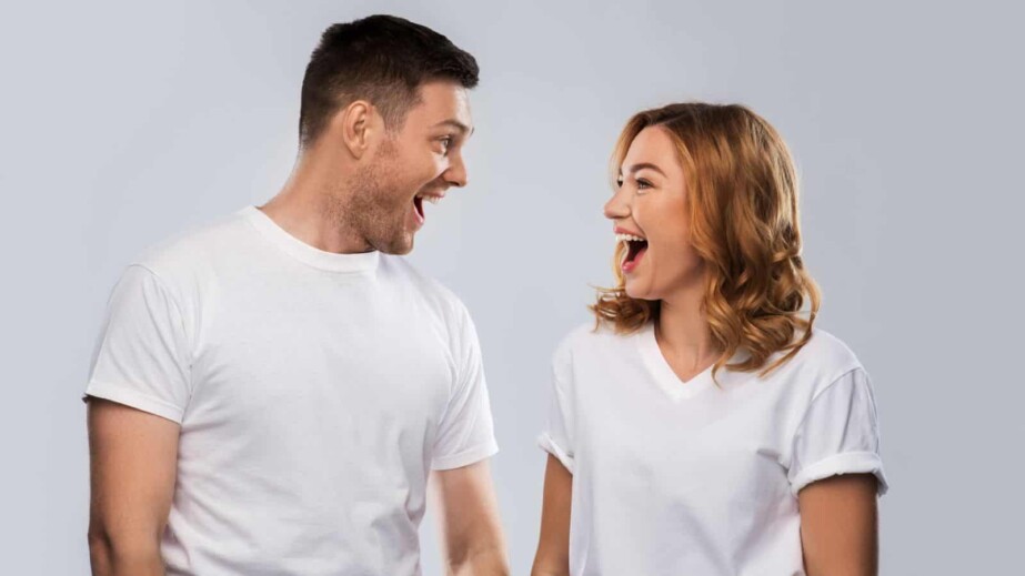 Happy Couple Wearing White Shirts