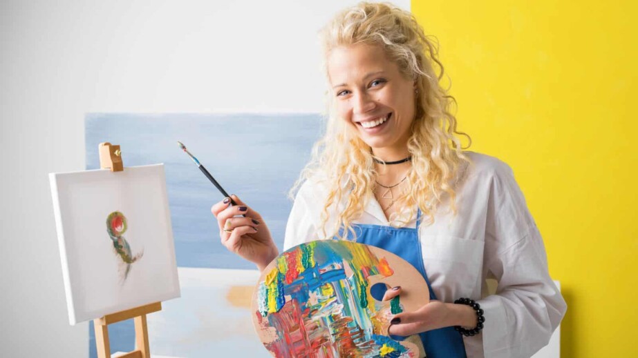 Happy Female Artist Painting