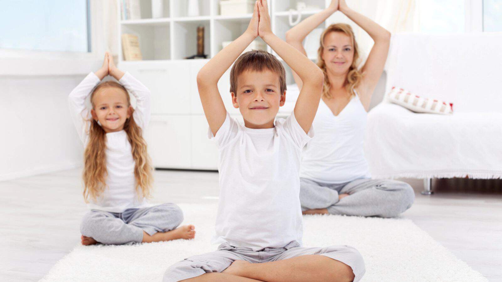 Happy balanced life - doing yoga exercise
