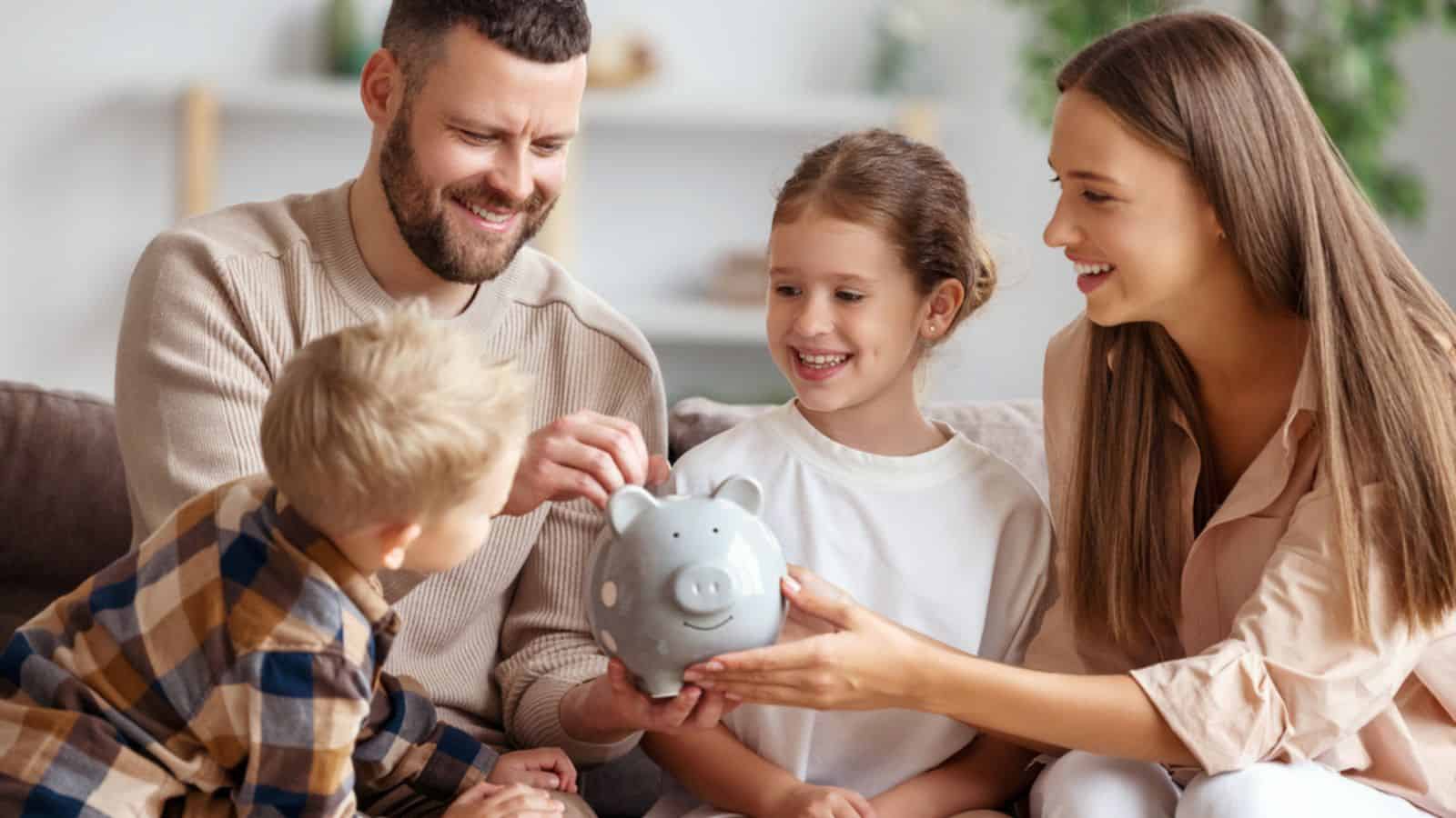 Happy family teach how to save money