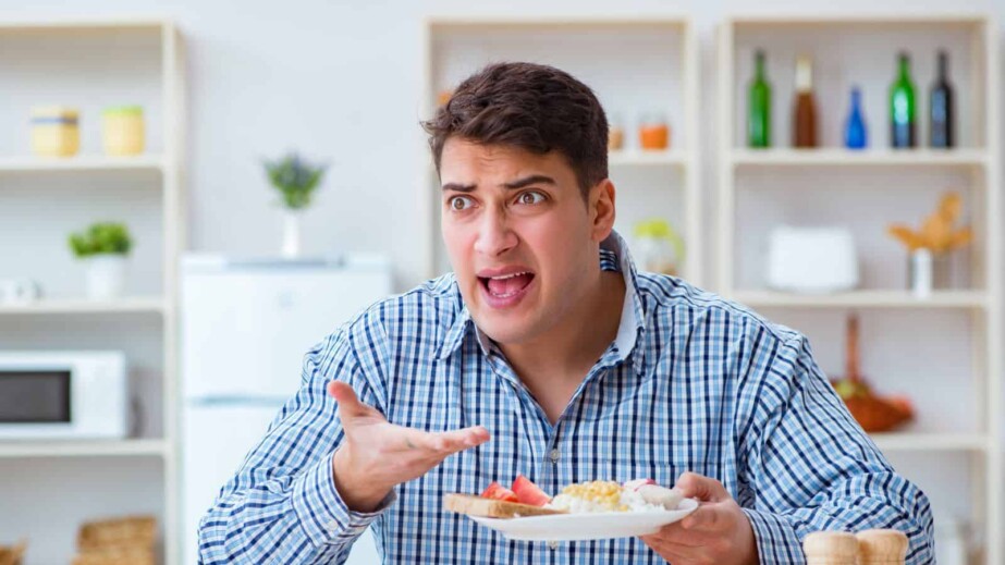 Husband eating tasteless food