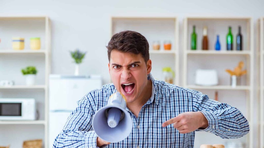 Husband with loudspeaker yelling at his wife