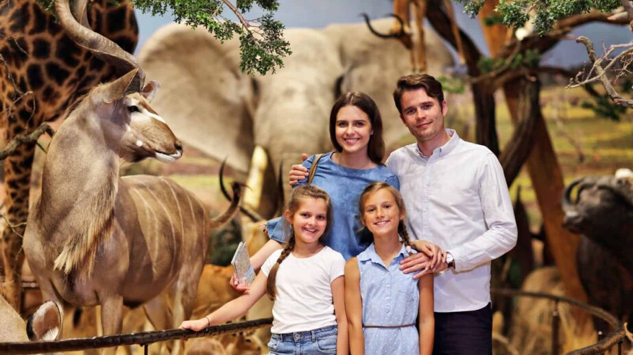 Joyful Family in Nature Museum