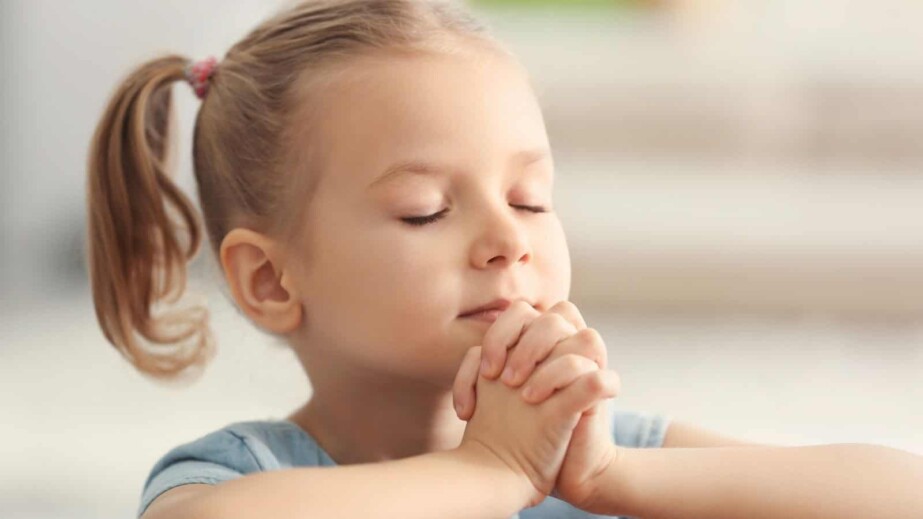 Little Girl praying at home