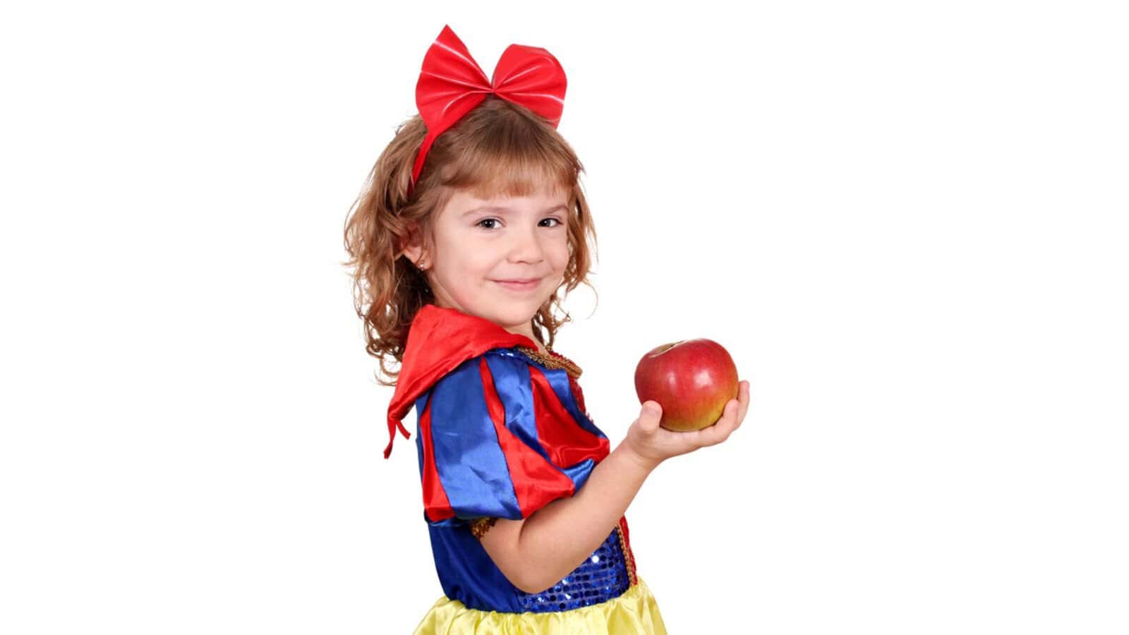 Little girl snow white with apple