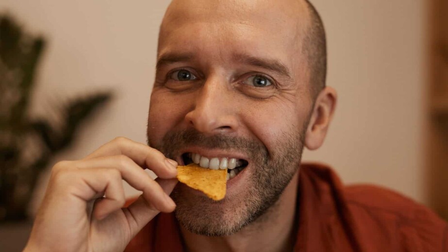 Man Eating Chips