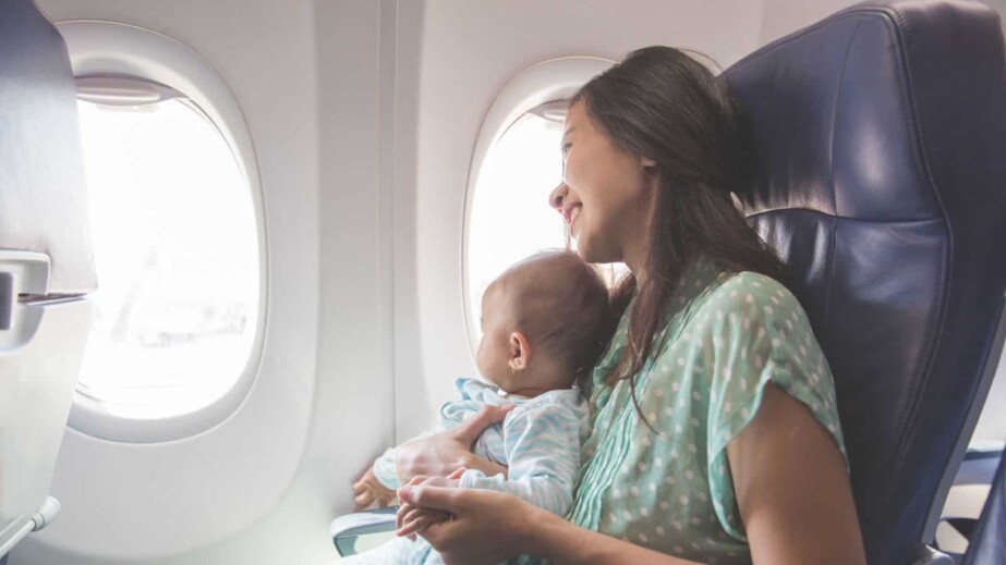 Mother and baby in Airplane