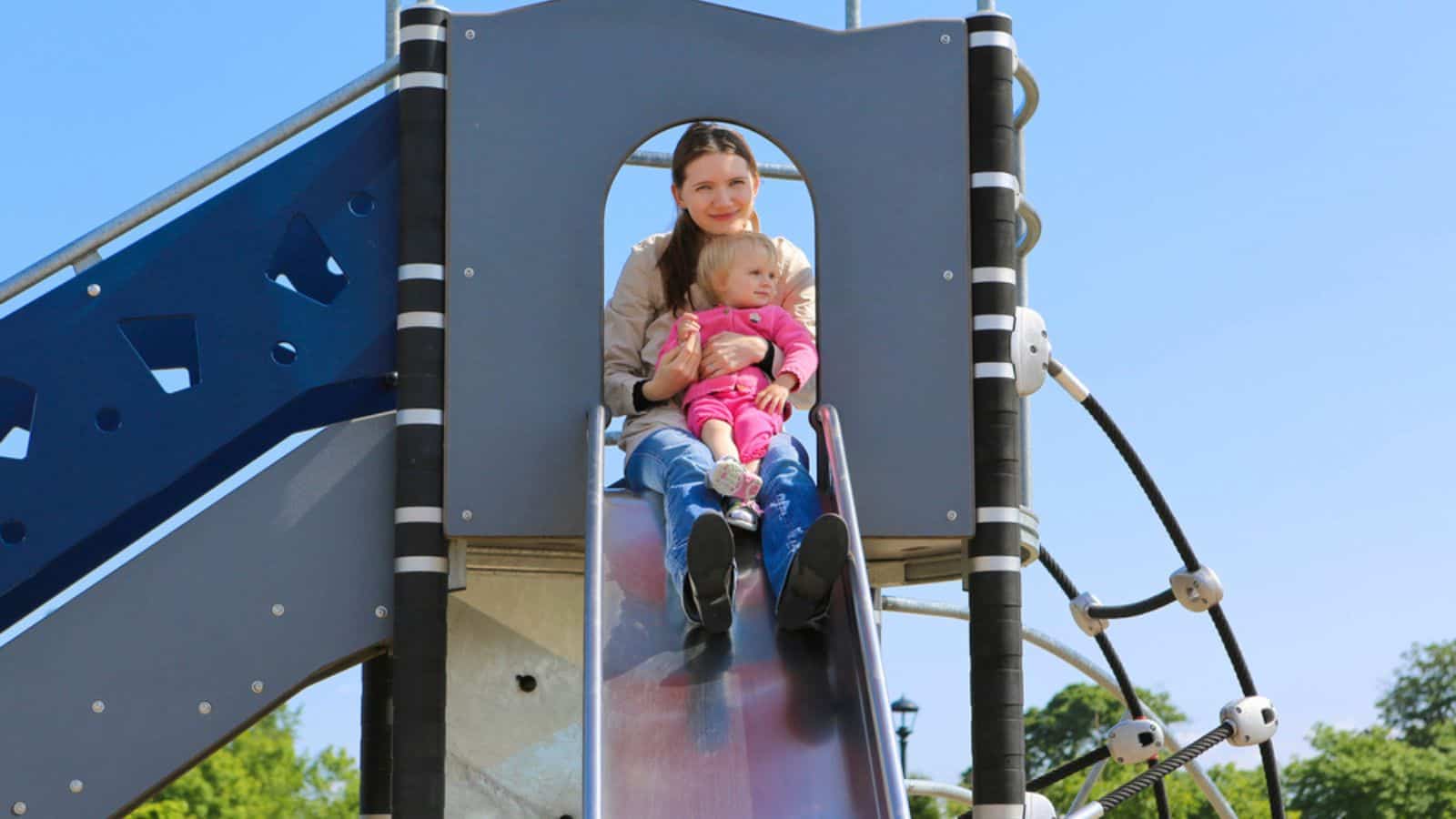 Mother with her daughter on playground