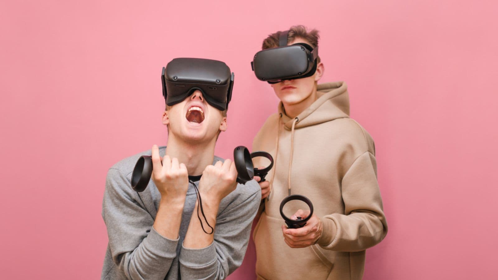 Portrait of emotional 2 young people in VR helmets