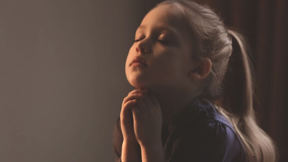 Religious Christian Girl Praying Indoors