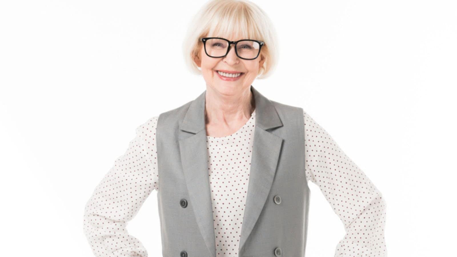 Smiling stylish senior businesswoman in eyeglasses