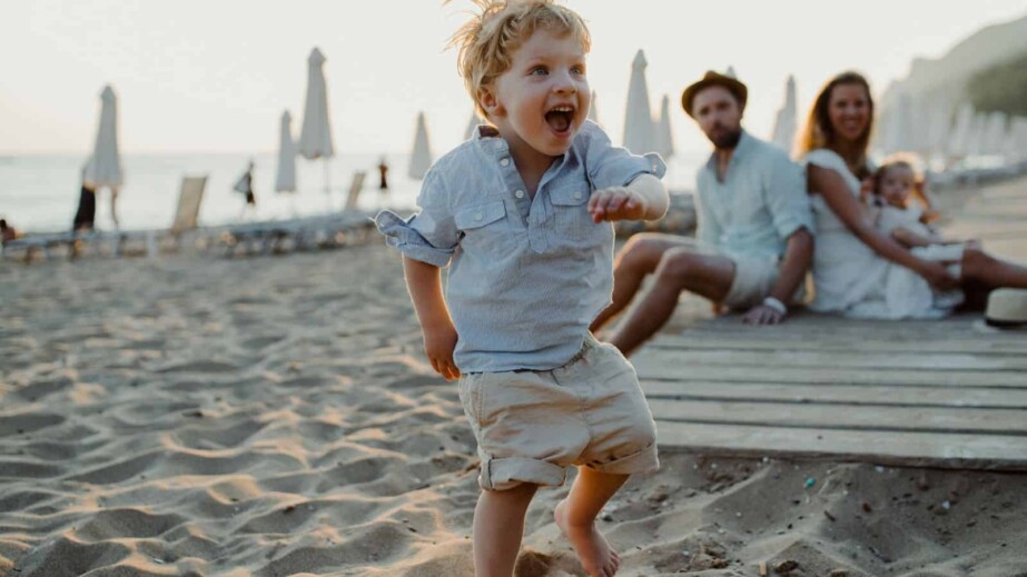 Toddler Boy Playing at Sandy Beach