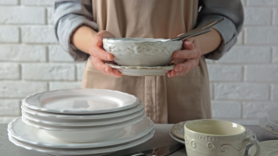 Woman Holding Porcelain Kitchenware