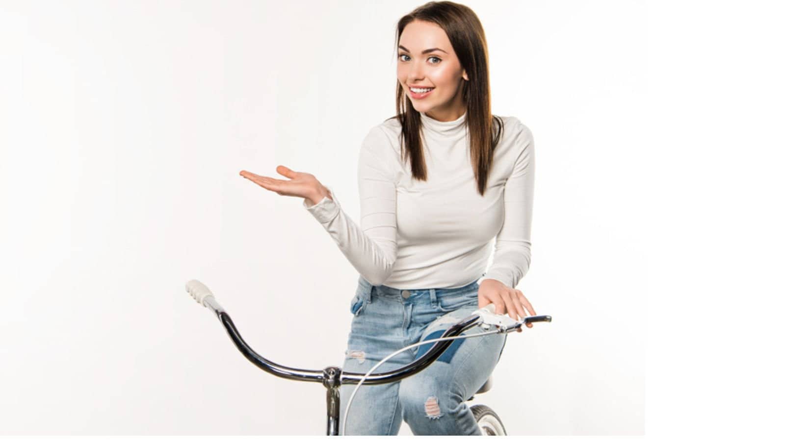 Woman sitting on bicycle