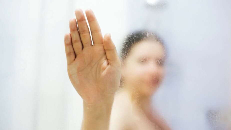 Young Happy Woman Taking Hot Shower