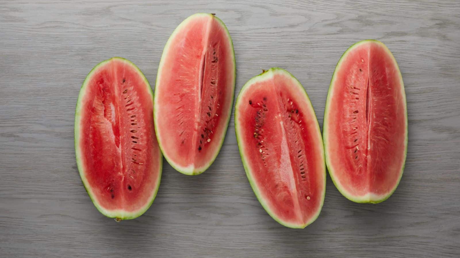 fresh watermelon slices on grey wooden