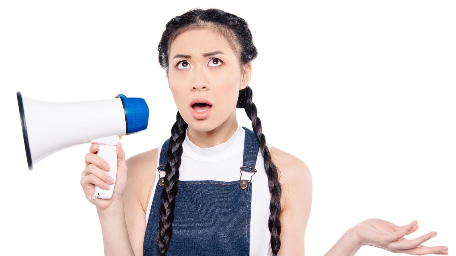 woman holding megaphone and confused