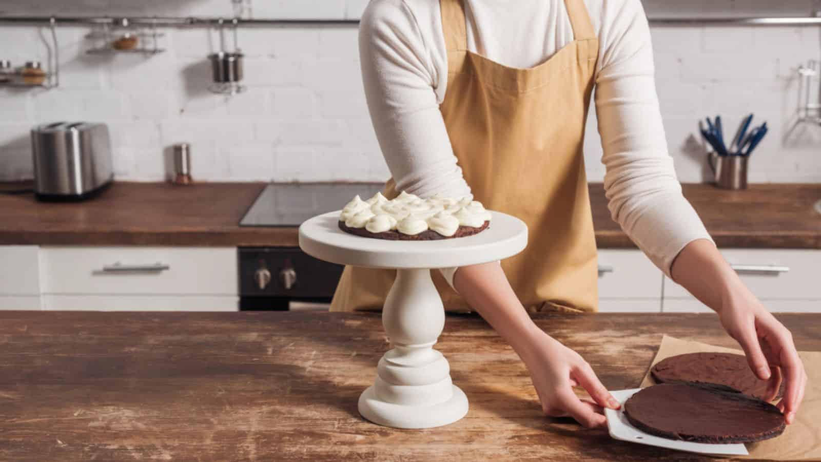 woman in apron cooking delicious whoopie pie